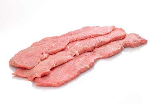 Veal cutlets escalope meat raw white isolated