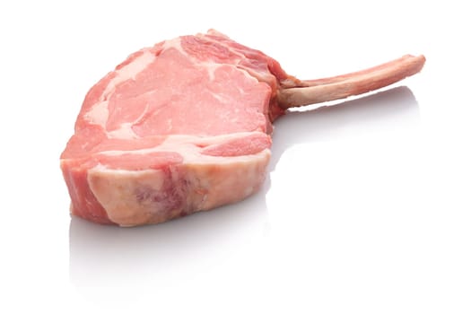 Veal cutlet with bone white isolated
