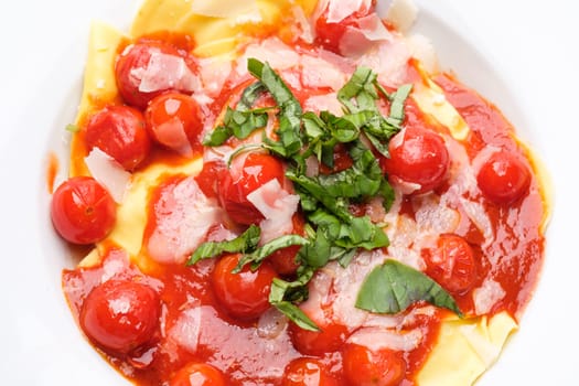Top view tomatoes tomato sauce basil parmesan and tortellini