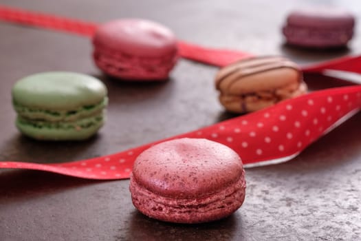 Red macaron close-up in back lit