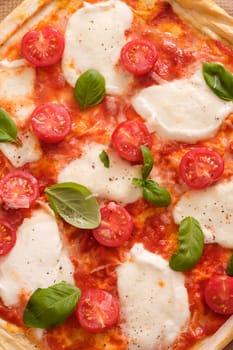 Top view pizza filou pastry with tomato cheese and basil