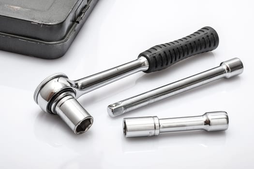 Ratchet with handle and socket and a tool box