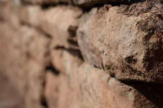 Stone wall old masonry close-up
