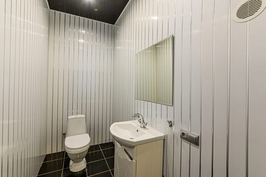 Russia, Moscow- December 05, 2019: interior room apartment modern bright cozy atmosphere. general cleaning, home decoration, bathroom, sink, decoration elements, toilet