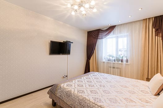 Russia, Moscow- December 05, 2019: interior room apartment modern bright cozy atmosphere. general cleaning, home decoration, preparation of house for sale. bedroom with bed