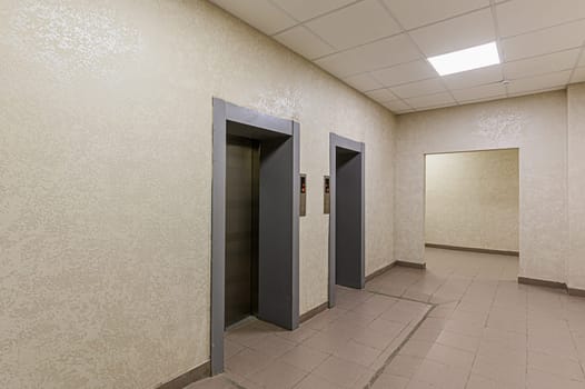 Russia, Moscow- December 05, 2019: interior room apartment public place, house entrance. doors, walls, corridors staircase