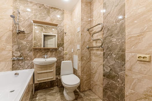 Russia, Moscow- December 05, 2019: interior room apartment modern bright cozy atmosphere. general cleaning, home decoration, preparation of house for sale. bathroom, sink, decoration elements, toilet.