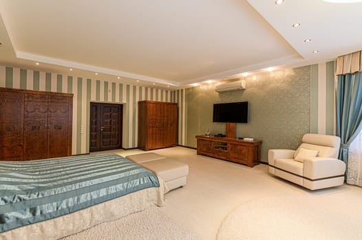 Russia, Moscow- December 05, 2019: interior room apartment modern bright cozy atmosphere. general cleaning, home decoration, preparation of house for sale. bedroom with bed