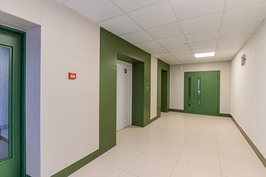 Russia, Moscow- December 05, 2019: interior room apartment public place, house entrance. doors, walls, corridors staircase