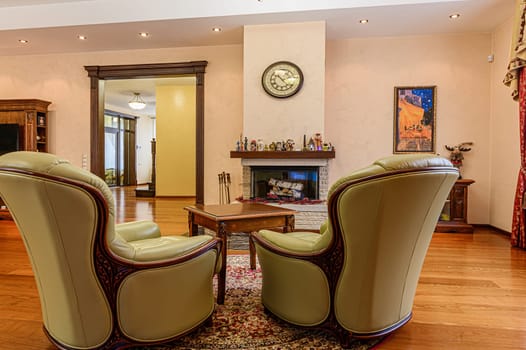 Russia, Moscow- December 05, 2019: interior room apartment modern bright cozy atmosphere. general cleaning, home decoration, preparation of house for sale, cozy fireplace with birch firewood