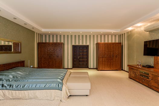 Russia, Moscow- December 05, 2019: interior room apartment modern bright cozy atmosphere. general cleaning, home decoration, preparation of house for sale. bedroom with bed