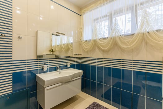Russia, Moscow- December 05, 2019: interior room apartment modern bright cozy atmosphere. general cleaning, modern bathroom, sink, decoration elements, toilet
