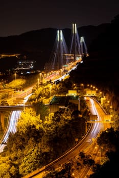 Sunset and light illumination of Tsing ma bridge landmark suspension bridge in Tsing yi area of Hong Kong China.