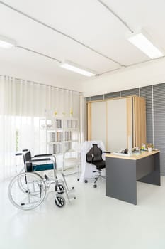 Interior of empty doctor office examination room workplace with equipment in clinic medical hospital of state health care center. Using for healthcare hospital industry concept.