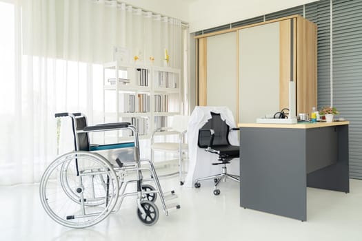 Interior of empty doctor office examination room workplace with equipment in clinic medical hospital of state health care center. Using for healthcare hospital industry concept.