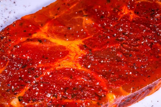 raw marinated pork neck with pepper