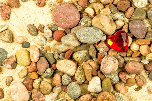 heart on a beach with stones