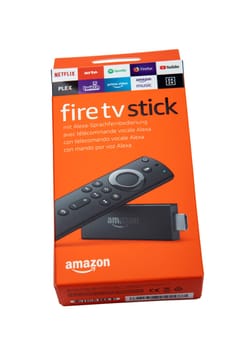 HUETTENBERG, GERMANY - FEBRUARY 03, 2020: Amazon Fire TV stick. Amazon Fire TV Stick is a low cost version in a HDMI-stick format of Amazon Fire TV, Android based.