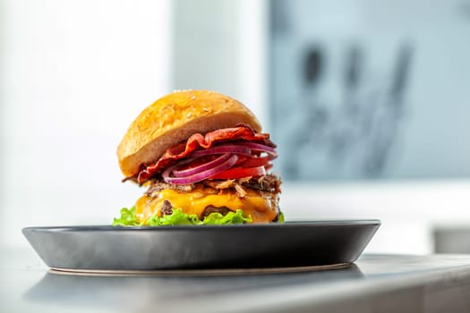 Close-up of home made tasty burgers on plate in restaurant. detail shot