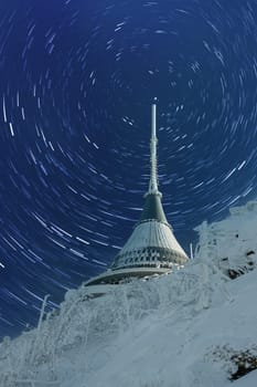 Czech Republic - Liberec - transmitter Jested in winter -with rotating stars. A large white buildingundefined