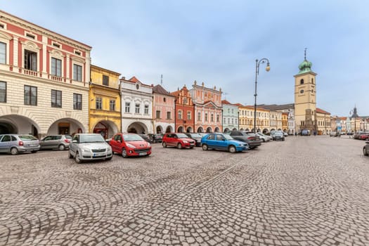 Litomysl, Czech Republic - May 25, 2019: The Town Hall building with the clock tower at the Market Square with cars
