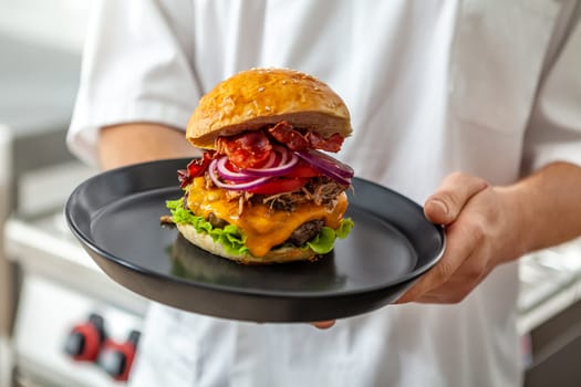 Close-up of home made tasty burgers on plate in restaurant. detail shot