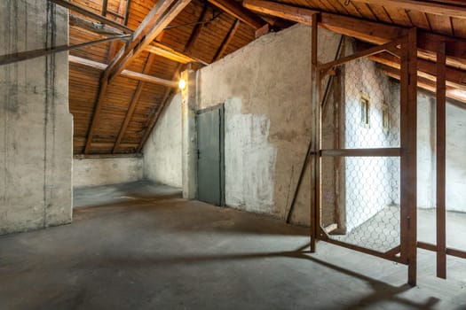 Empty old rustic attic with door. High quality photo
