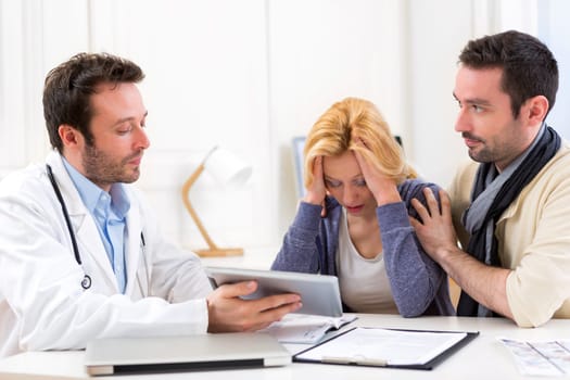View of a Man goes with his girlfriend on her visits to the doctor
