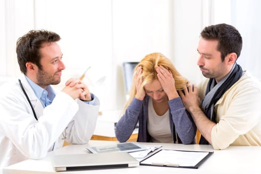View of a Man goes with his girlfriend on her visits to the doctor