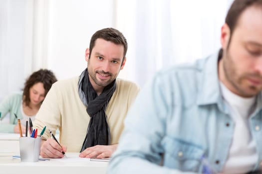 View of a Young attractive man taking competitive exam