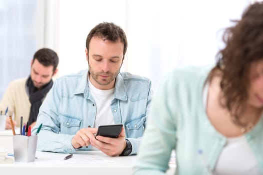 View of a Young attractive student taking mathematics exams
