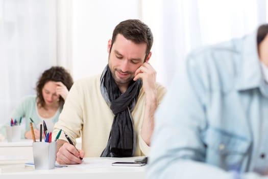 View of a Young attractive man taking competitive exam