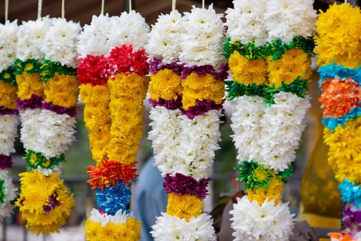 Indian colorful flower garlands for sales during diwali festival