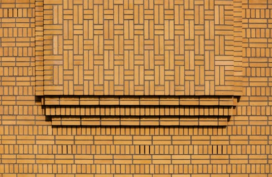 ..Brick wall of a building in art deco style..