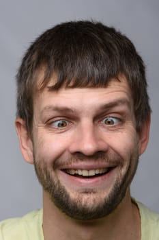Closeup portrait of a crazy man of European appearance