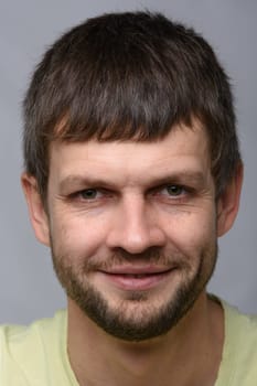 Closeup portrait of a successful smiling man of European appearance