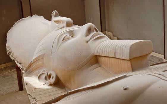 Head statue of Ramses II in open air museum of Memphis, Egypt