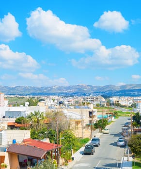 Skyline of Paphos, road and mountains, Cyprus