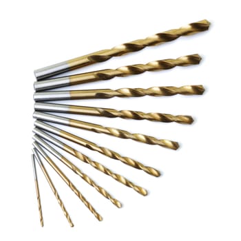 A top view of a set of drill bits on a white background