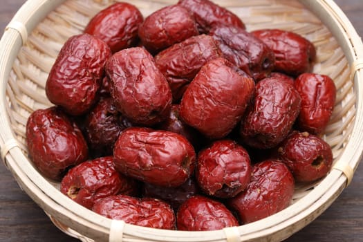 Dried Jujube, Chinese dried red date fruits in a bamboo basket