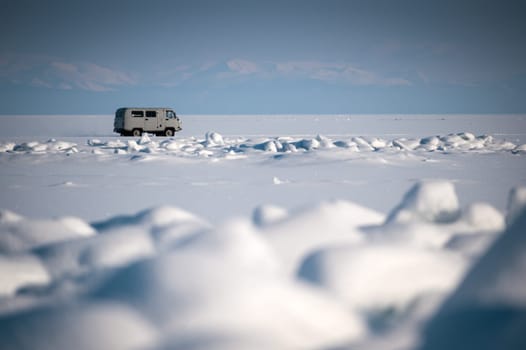 Traveling by car in Lake Baikal. This trip is popular for the winter time of Lake Baikal.