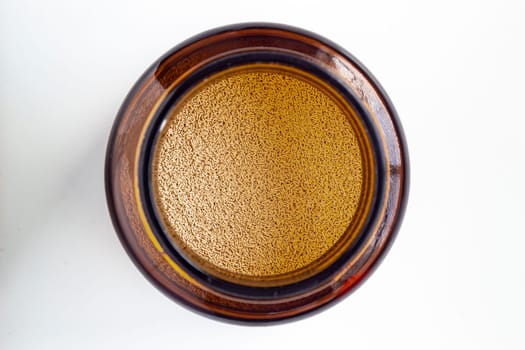 A top view of baking container with baking yeast