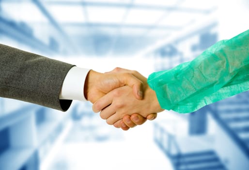 Business men and doctor hand shake, close up