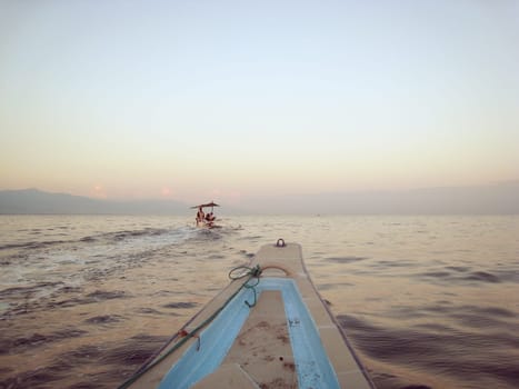 boat spider legs for viewing dolphins in bali