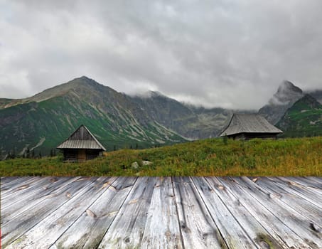 wood terrace and perspective view on mountains