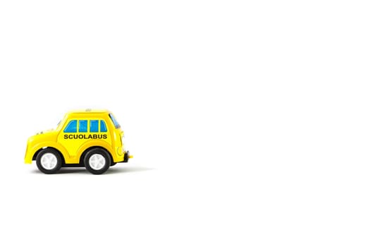 Caricature of a school bus. Little toy caro f a Italian school bus