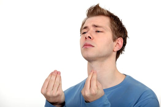 Young man imploring