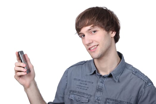 Young man holding a mobile phone