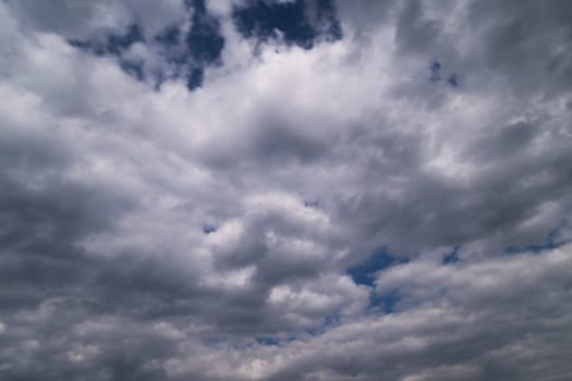 dramatic sky with cumulus clouds for use as background