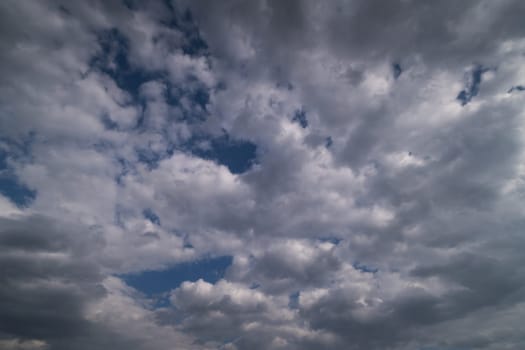 dramatic sky with cumulus clouds for use as background